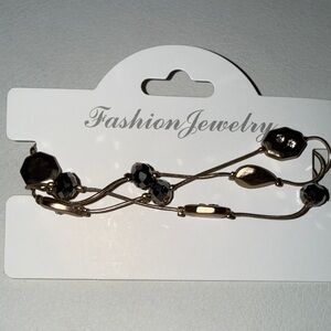 #214. Gold and Black Bracelet